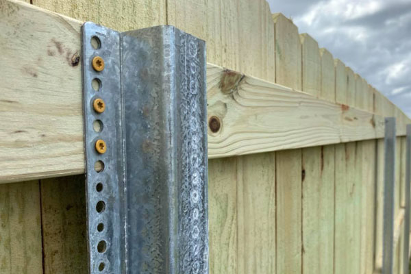 metal fence posts for wood fence.