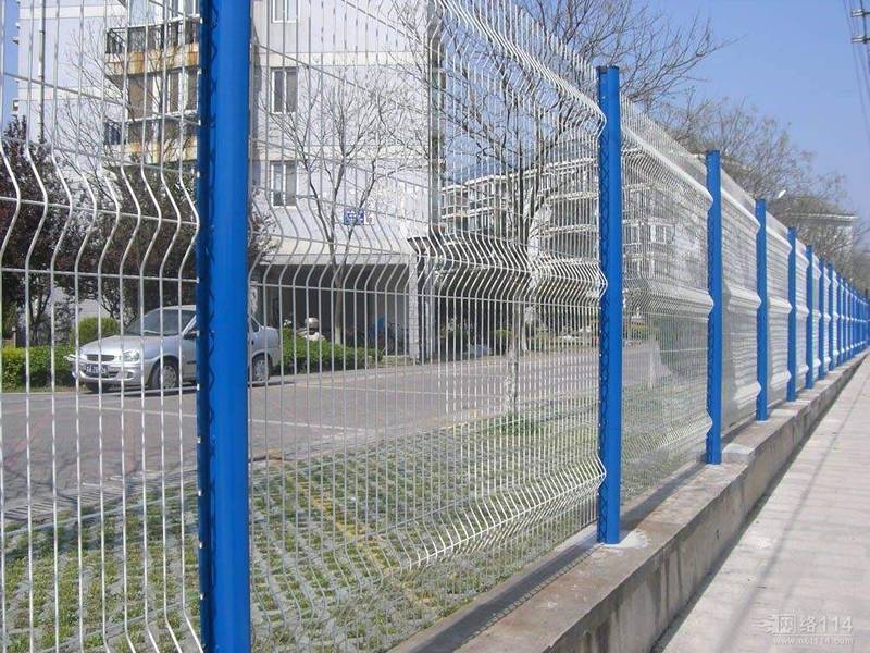 Blue color peach post supporting white 3D security fence are installed as the security wall of residence.
