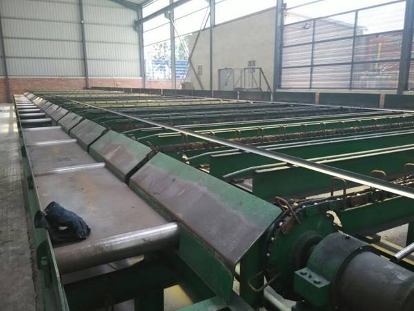 A straightening production line of star pickets.