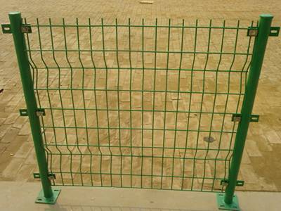 a part of fence fixed with green PVC coated round posts