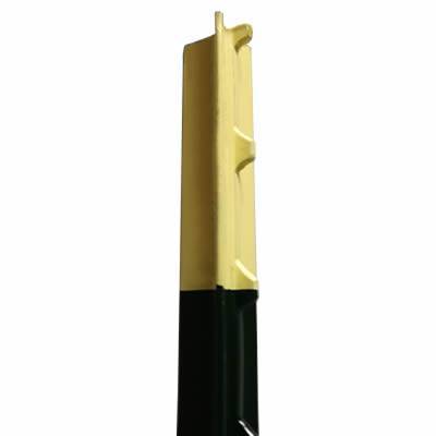 Green color studded T post with yellow painting on the top of post.