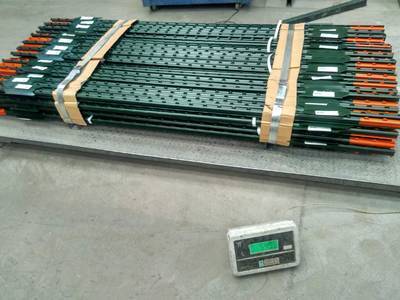 Several bundles of USA studded T post with red point.