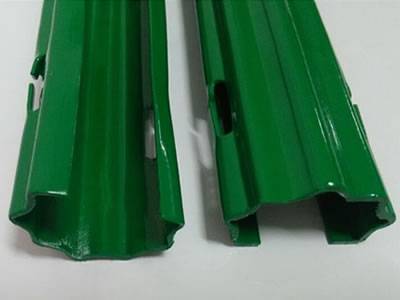 Two sides of green color PVC coating vineyard post.