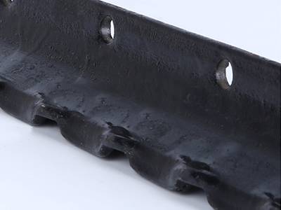 A detail of teeth and holes on the Y post.